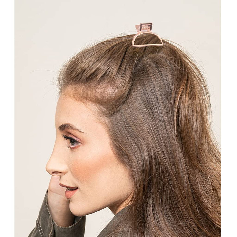 IAXSEE clips arranged near mirror on desk illustrating easy daily styling convenience