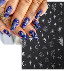 IDDFEVE tweezer application placing a moon sticker demonstrating easy, precise DIY nail placement