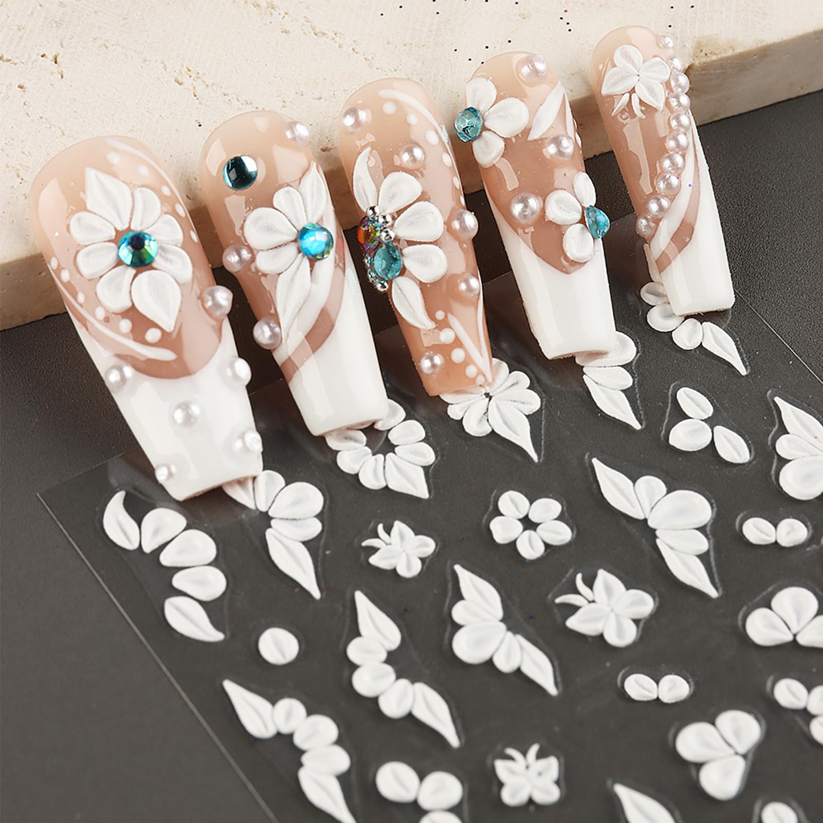 IDDFEVE finished manicure set showcasing floral butterflies and elegant polished look