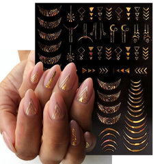 IDDFEVE decal applied on nail showing a sleek golden arrow accent for polish
