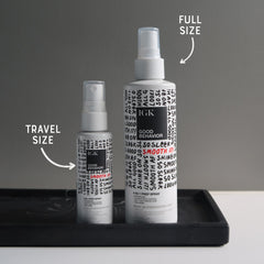 IGK travel size bottle held in hand for convenience and on-the-go use