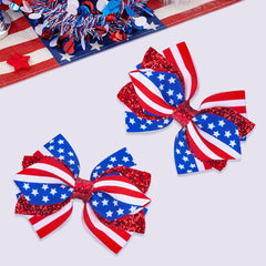 IKOLA family celebrating outdoors with bows, showing coordinated patriotic accessory