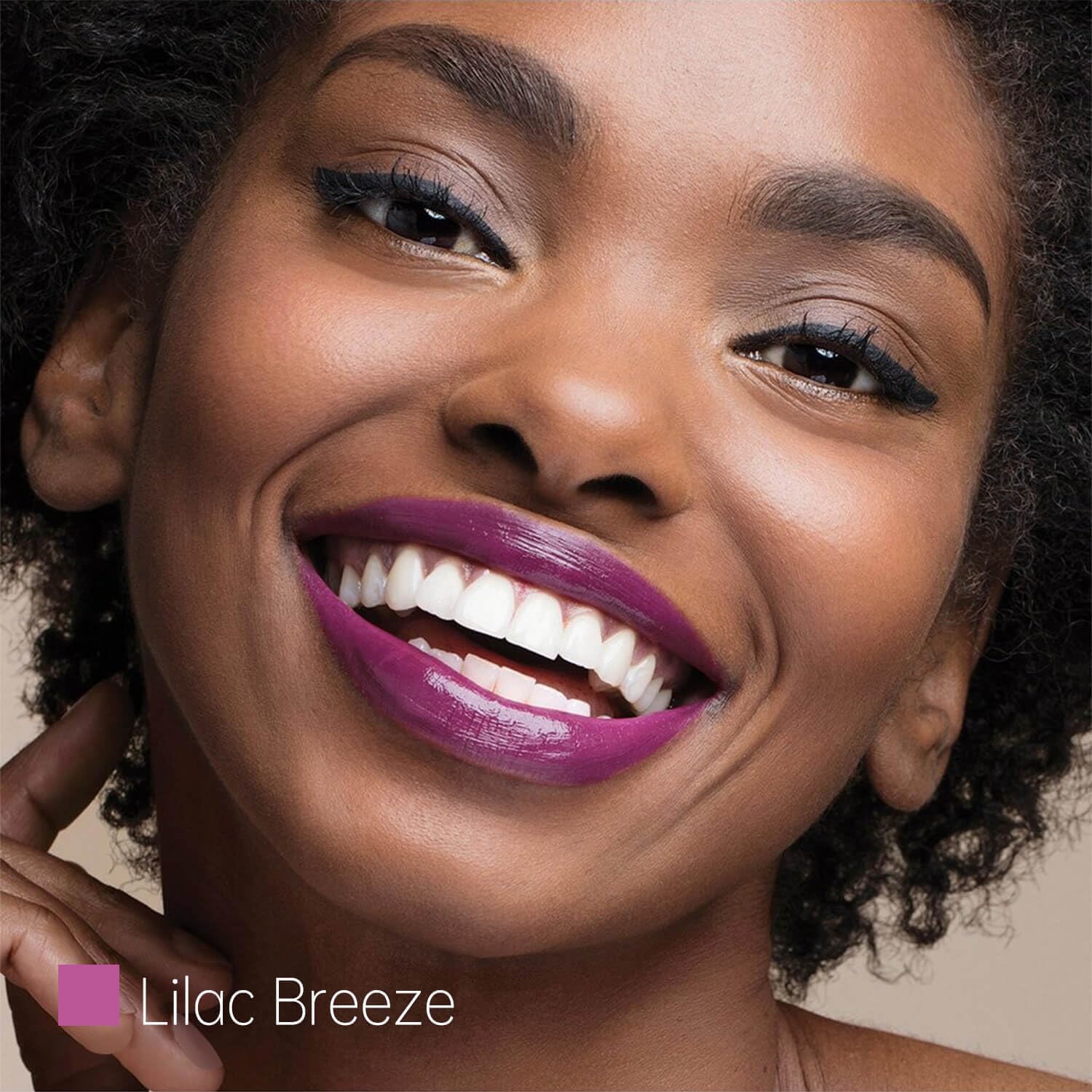 ilembane lip swatch on hand showing glossy lilac tint and hydration