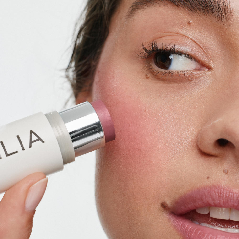 ILIA arm swatch demonstrating buildable mauve rose tint