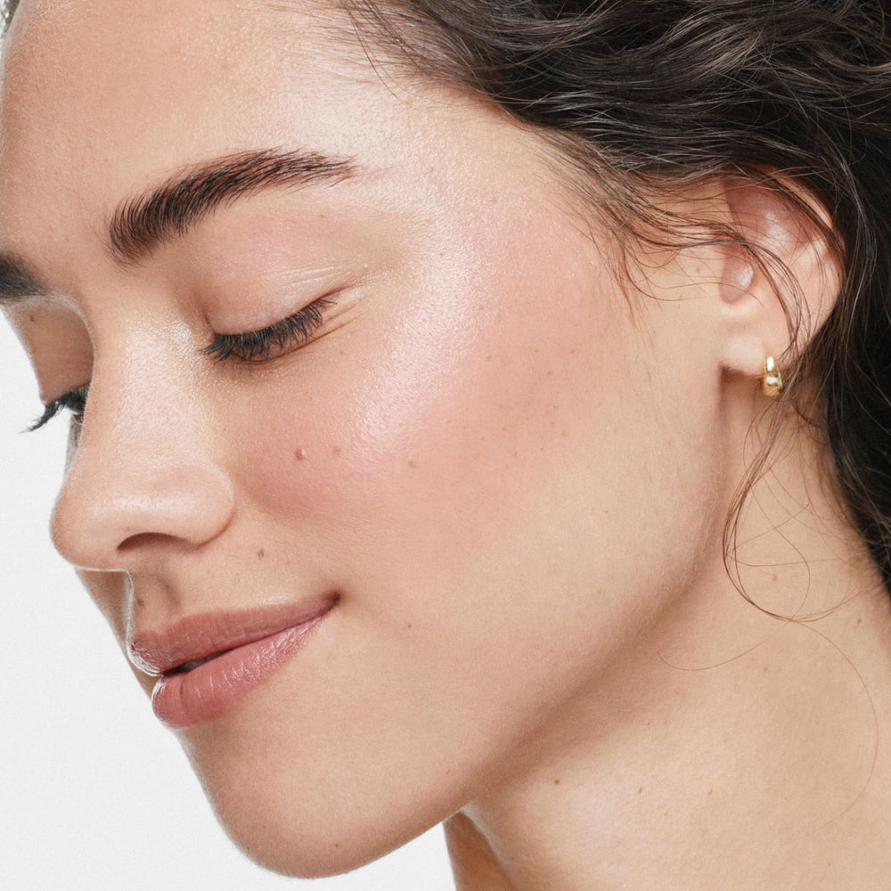 ILIA closeup of creamy texture highlights shea butter creaminess for smooth blendability