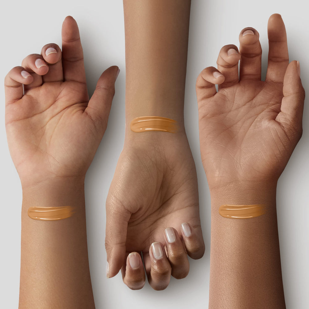 ILIA swatch on hand showing Morgat ST11.5 blendability and natural coverage