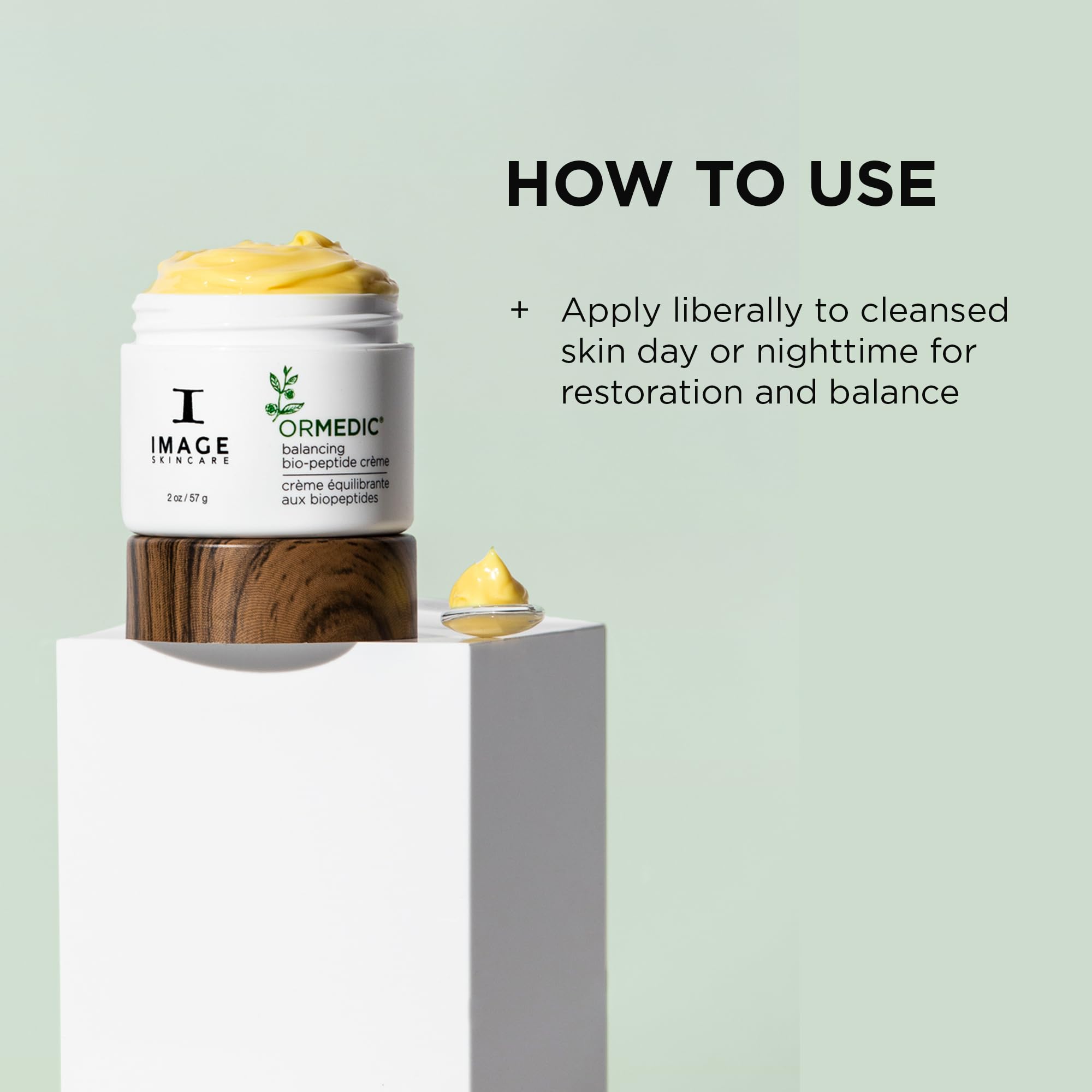 IMAGE Skincare ORMEDIC 2oz jar beside coin for size reference and travel-friendly benefit