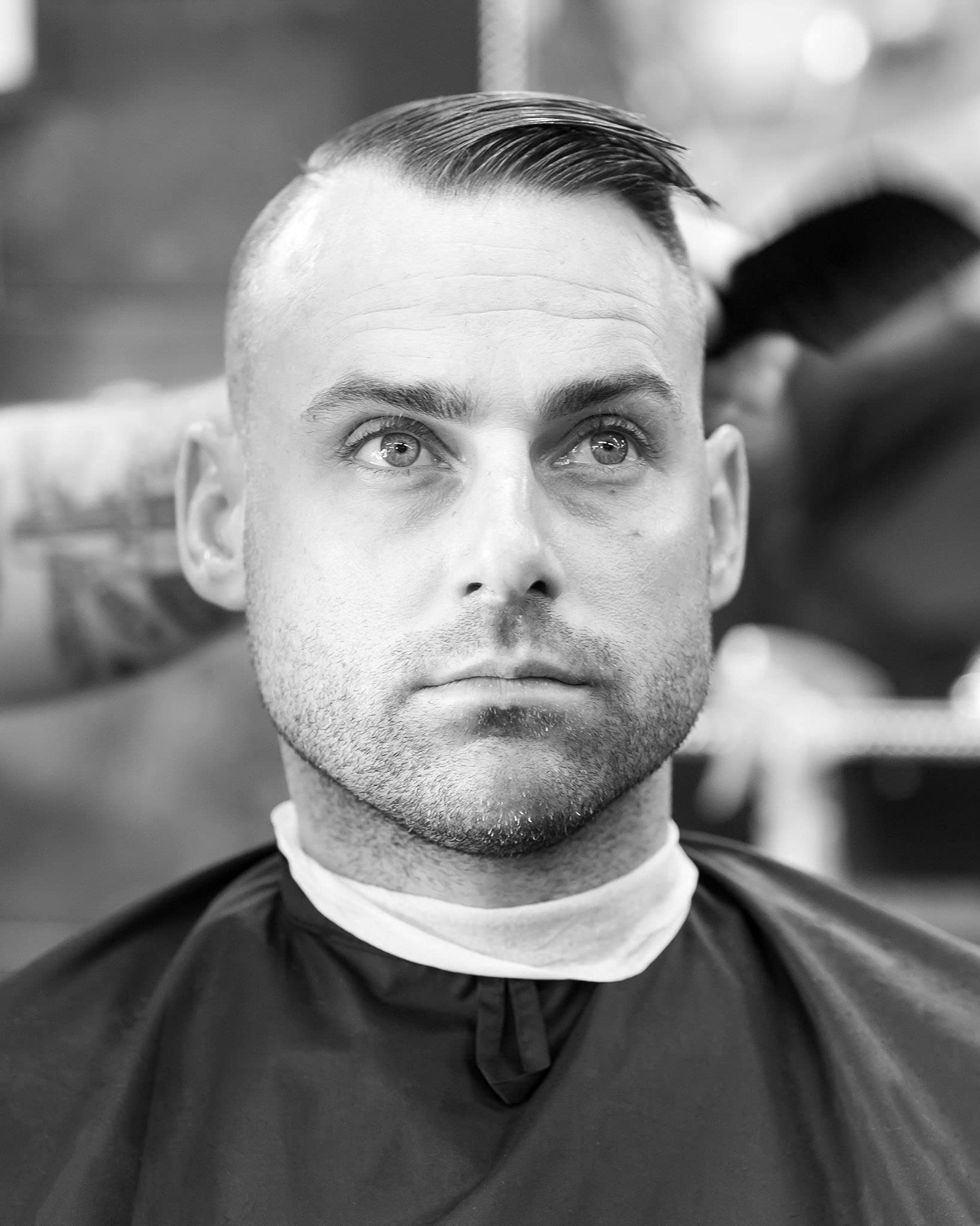 Imperial Barber paste on fingers demonstrating easy application and pliable hold
