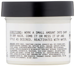 Imperial Barber open jar close-up showing matte paste texture and smooth spreadability