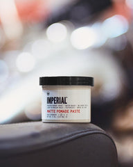 Imperial Barber styling in use by hands creating textured, natural hairstyle
