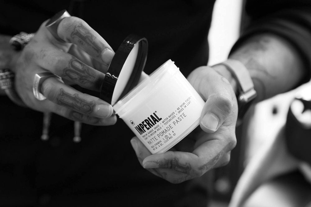 Imperial Barber paste rinsing under water to show quick, clean washout