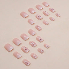 IMPOBLNS hand wearing short square nails to show scale and comfortable fit