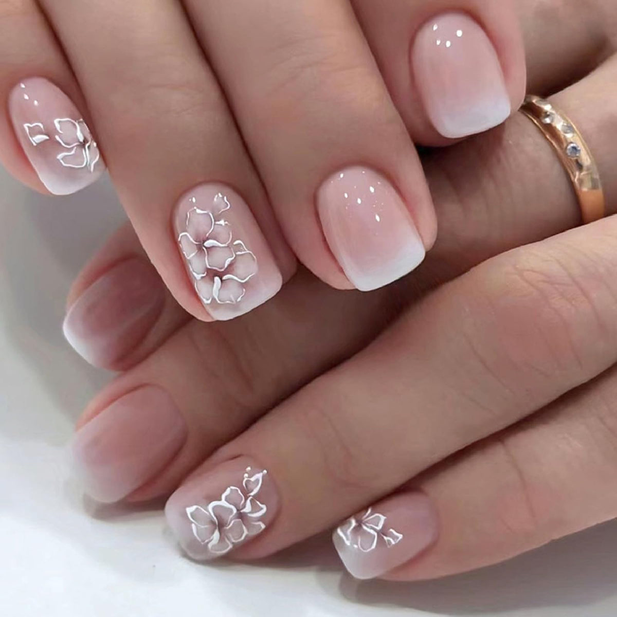 IMPOBLNS front packaging showing 24-piece floral press-on nails, easy salon look