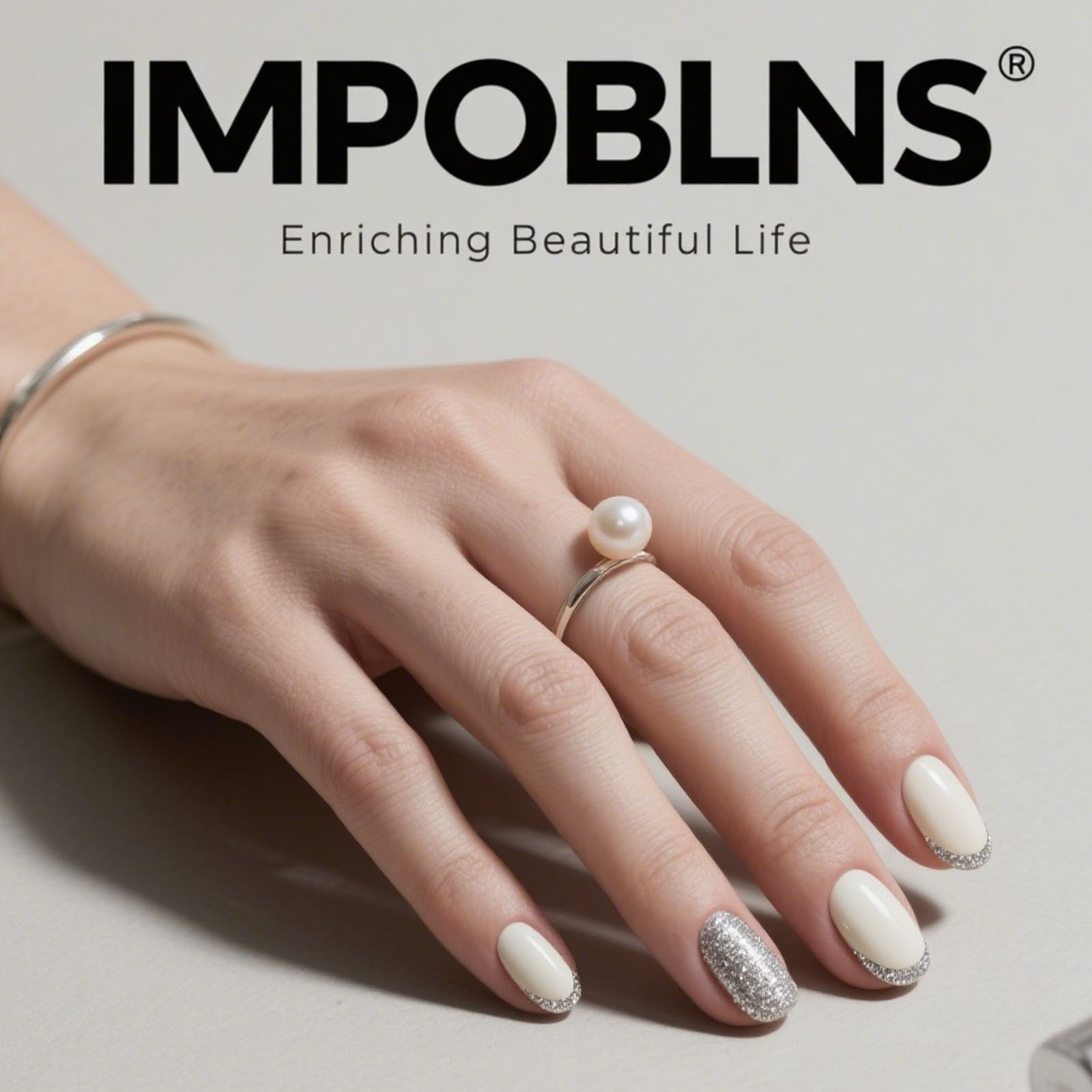 IMPOBLNS interior adhesive close-up on a press-on, demonstrates reusable pre-glue bond