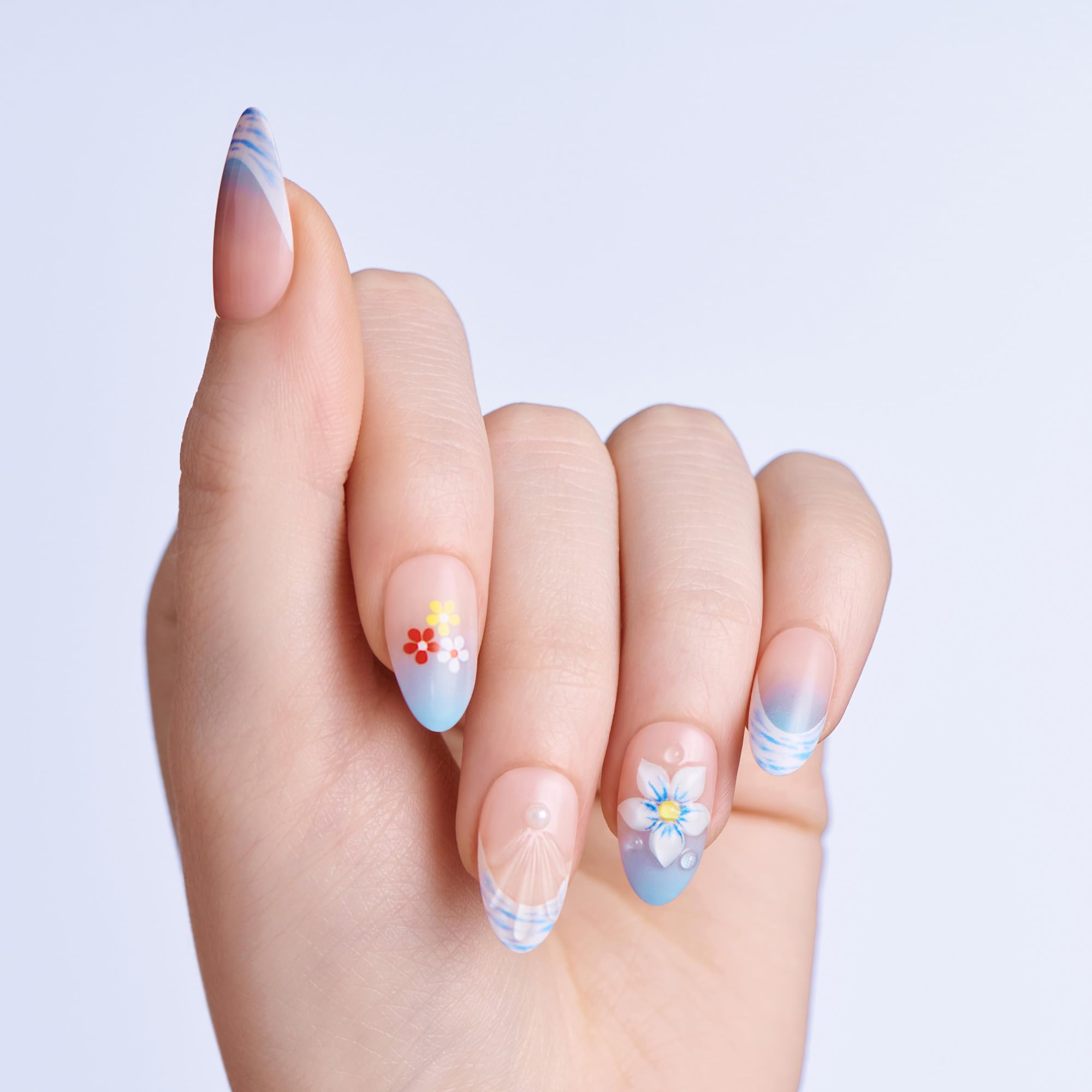 imPRESS close-up of seashell and pearl accents highlighting intricate design detail