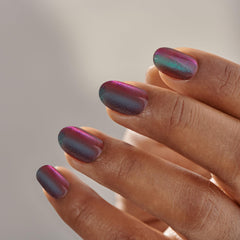 imPRESS lifestyle photo of finished manicure at night showcasing elegant high-gloss effect