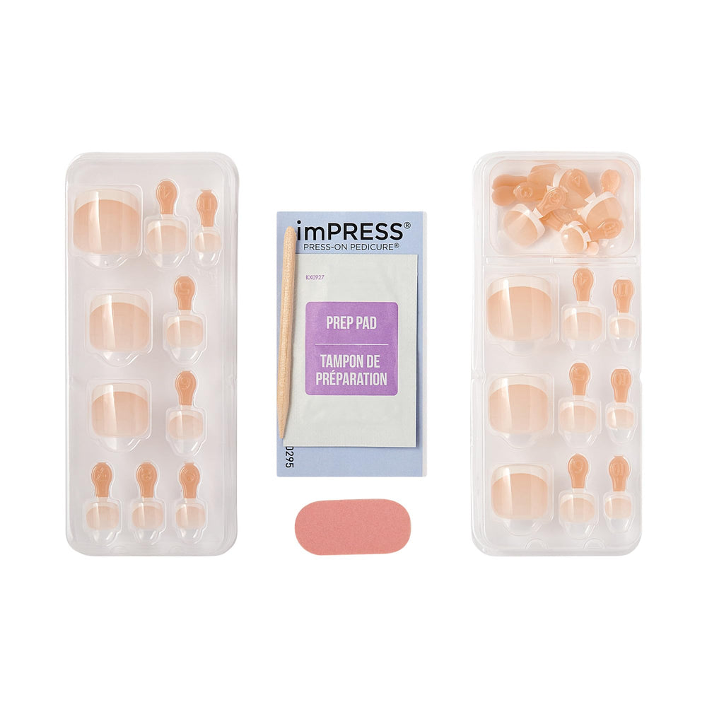 imPRESS nail lifted to show pre-applied adhesive strip for mess-free application