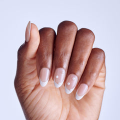 imPRESS array of 30 nails spread by size showing white almond design and variety, easy selection