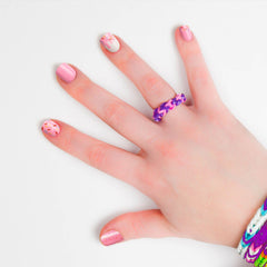 imPRESS close-up of pink glitter sprinkle finish highlighting playful sparkle and wearability