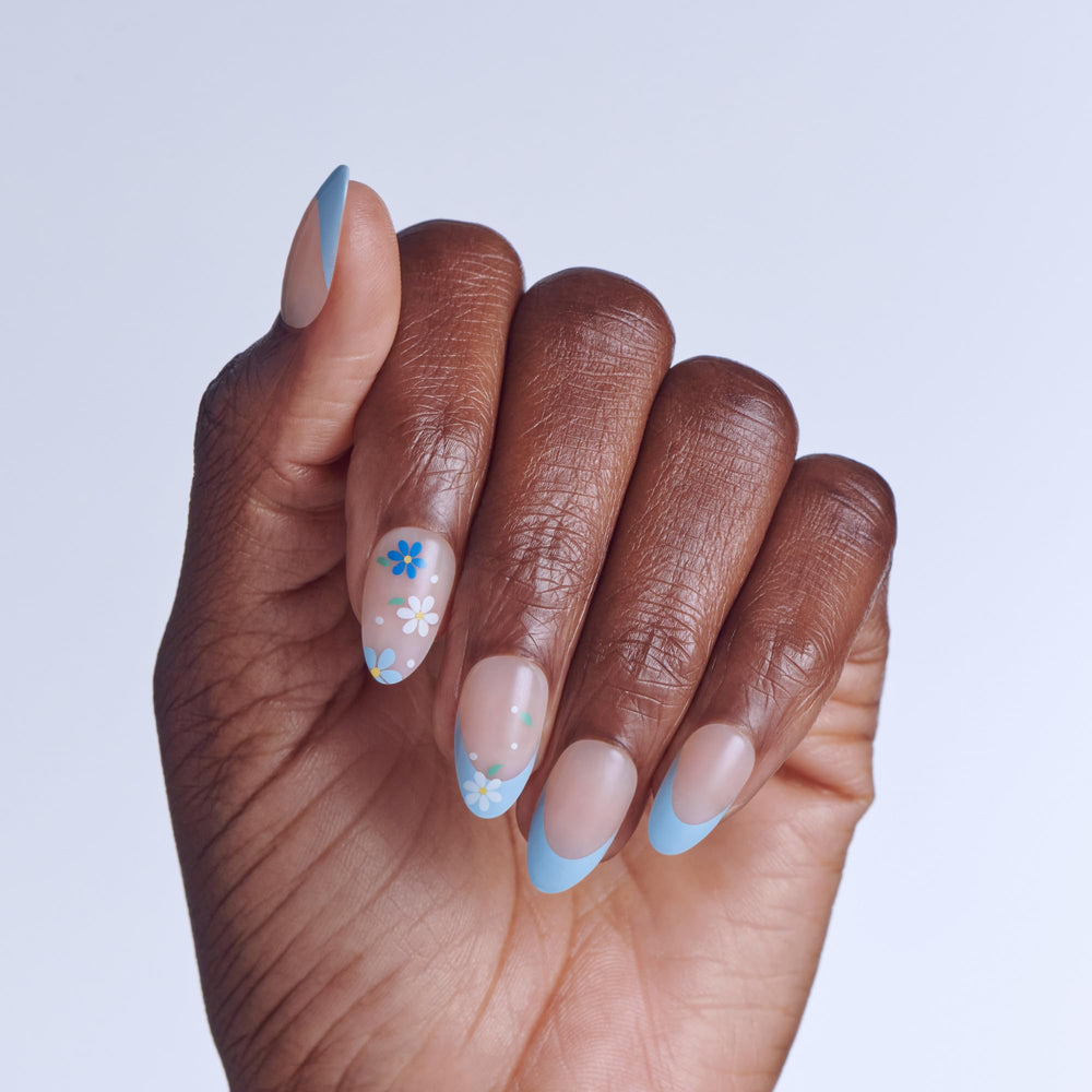 imPRESS close-up of pastel-blue tips and nude base, shows pattern clarity and polish