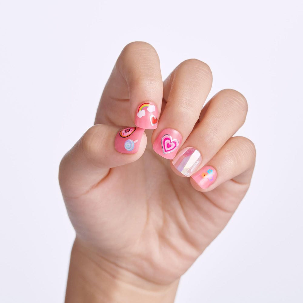 imPRESS close-up of solid pink mini squoval nails for comfy fit