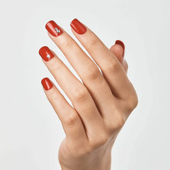 imPRESS KISS nails beside coin for size comparison confirming short length