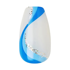 imPRESS nails beside coin showing scale and medium length for realistic fit