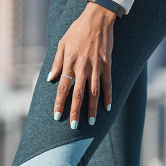 imPRESS nails in hand showing size scale and ease of at-home application benefit