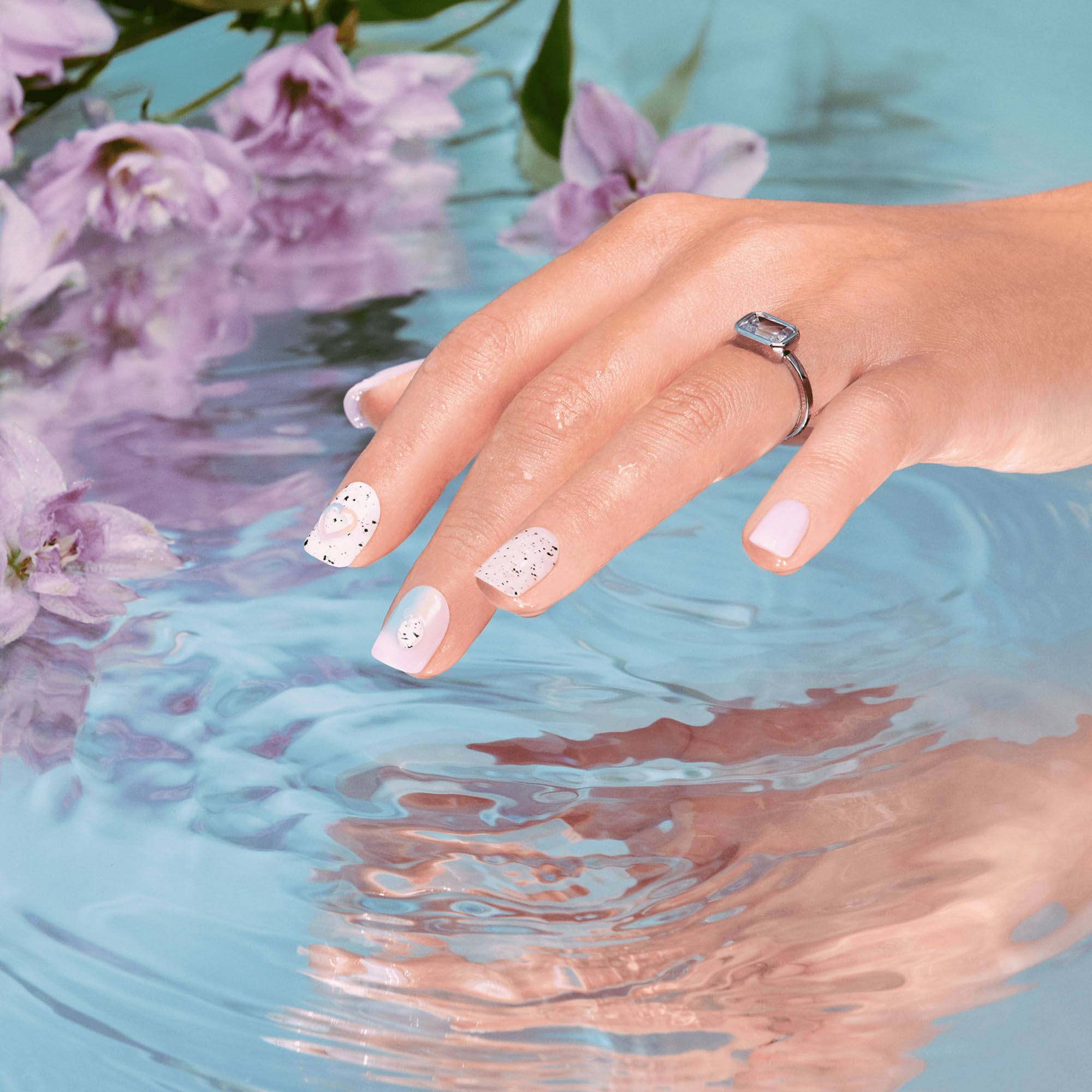 imPRESS nails next to coin for scale, clarifies sizing