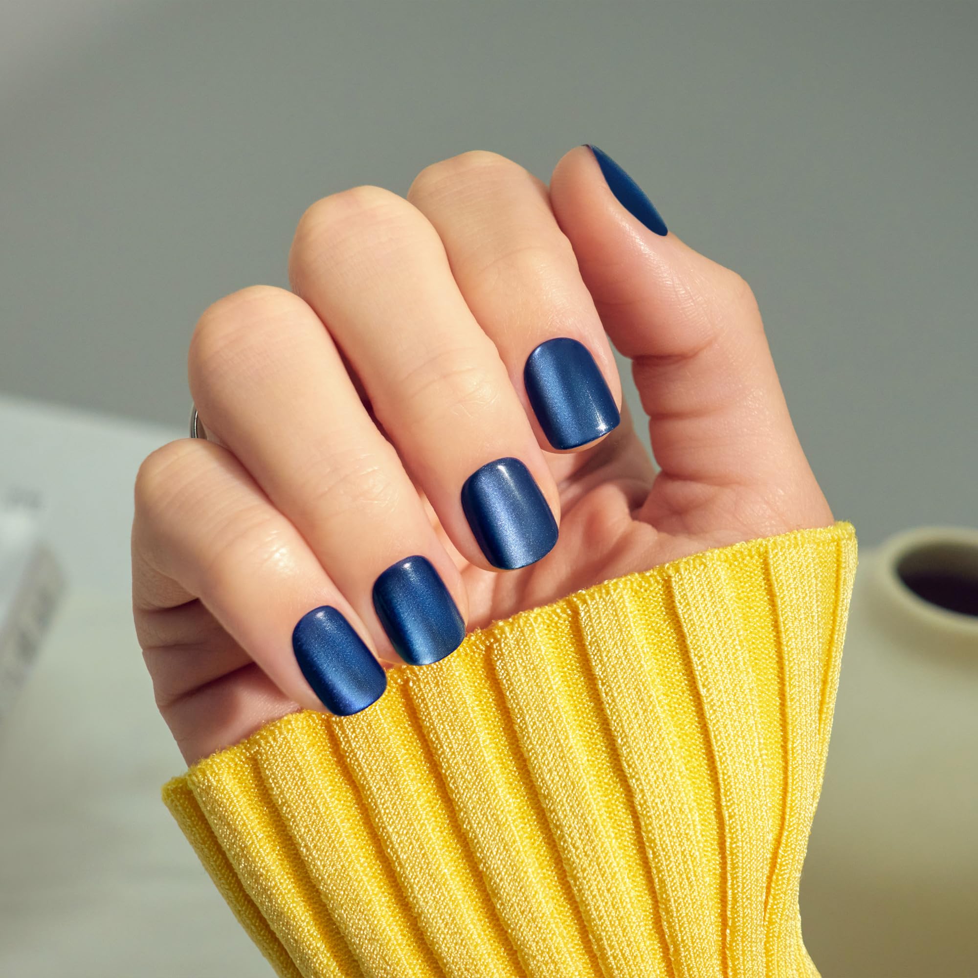 imPRESS top view of all 30 short squoval nails arranged for size selection