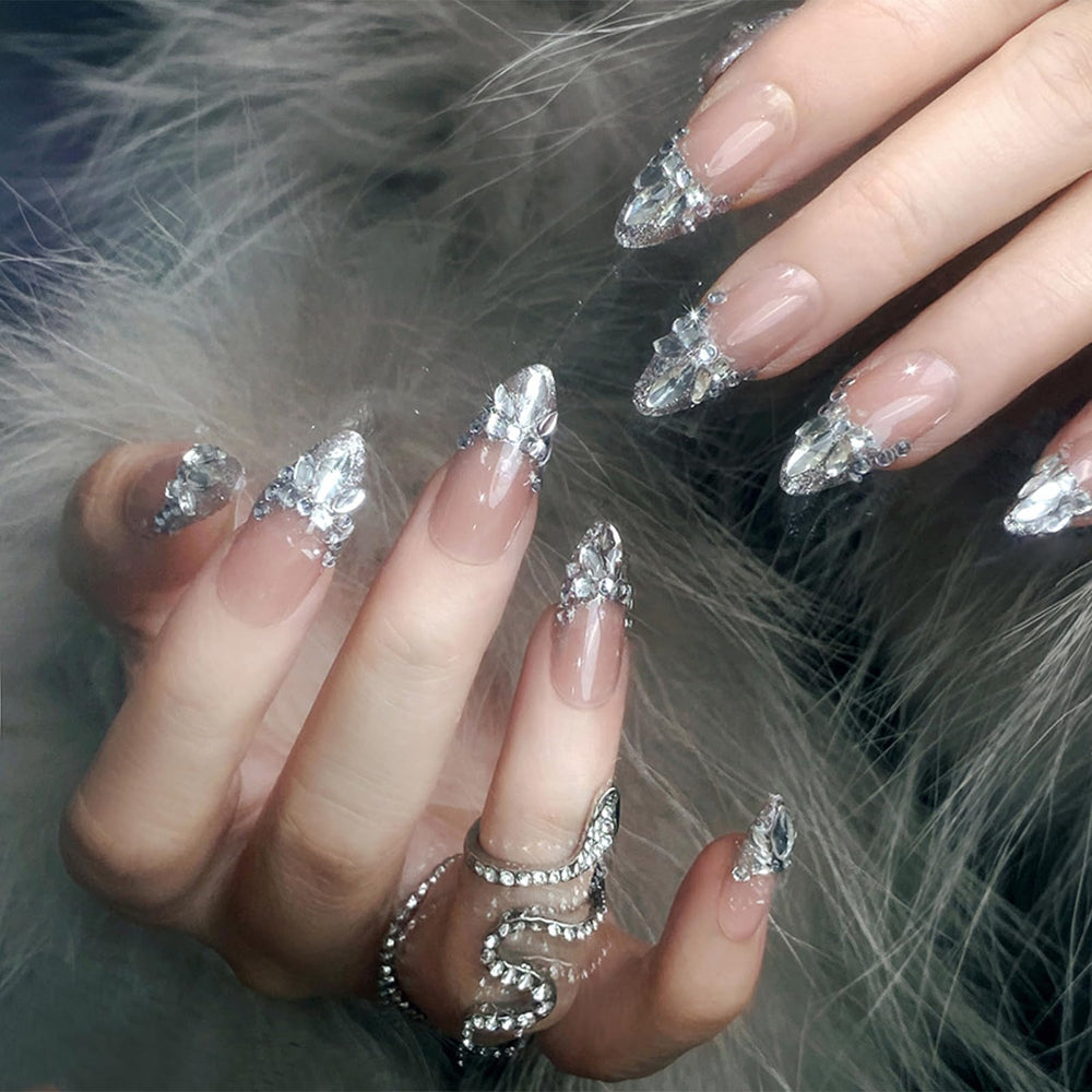 IMRAIN rhinestone close-up on glitter French tip, showcases sparkling decorative detail