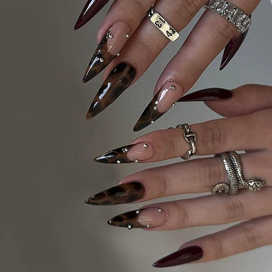 IMRAIN front packaging showing 24-piece brown leopard nails and glue for instant styling