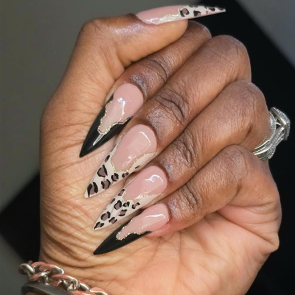 IMRAIN hand model wearing stiletto nails to show length and flattering scale