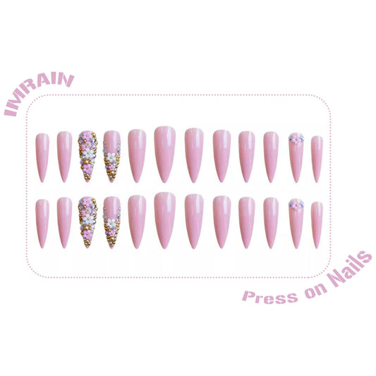 IMRAIN close detail of rhinestones and sparkle adding glamorous accents to manicure