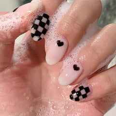 IMSOHOT front packaging showing 24-piece checkerboard nails and instant style