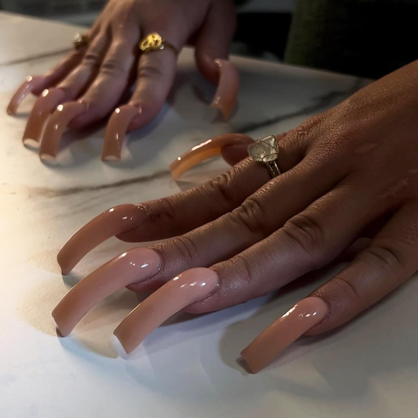 IMSOHOT nails worn at a party scene showing elegant nude look perfect for events