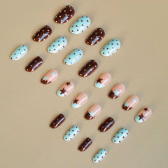 IMSOHOT nails applied on a hand, demonstrating instant salon-ready manicure benefit
