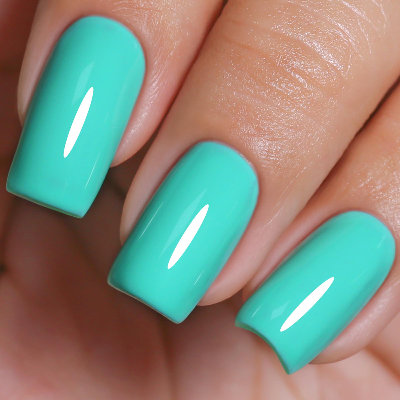 Imtiti cyan front bottle showing vibrant cyan color and 0.5oz size benefit