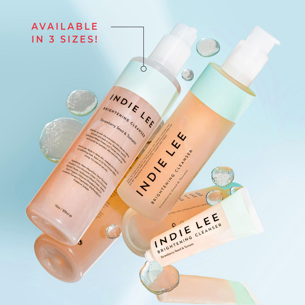 Indie Lee with strawberries and sunflower highlighting antioxidant ingredients