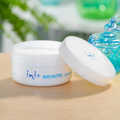 Inis cream texture close-up revealing rich whipped butter for deep moisturization