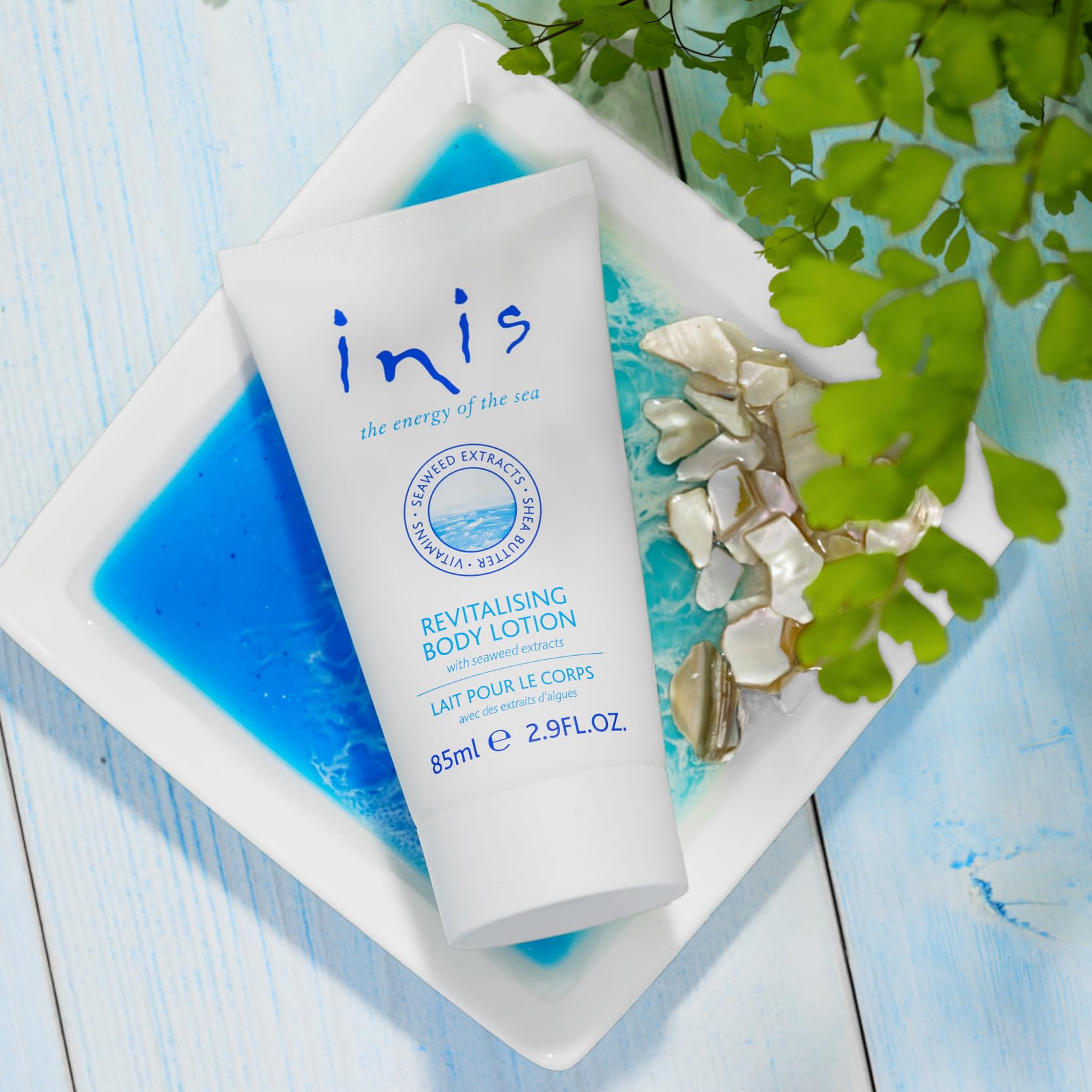Inis lotion close-up texture swirl highlighting creamy formula and quick absorbency benefits