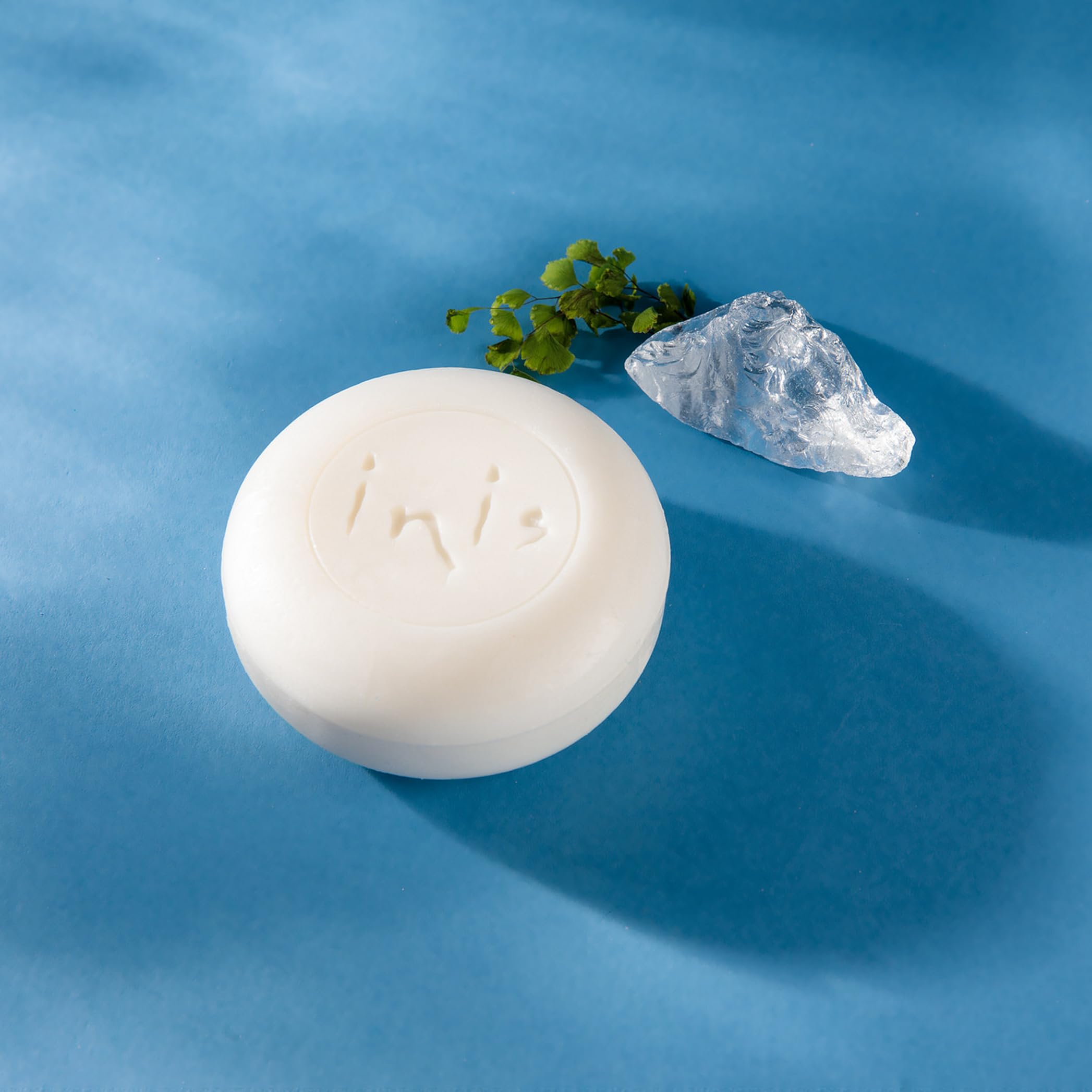 Close-up texture of Inis soap surface highlighting triple-milled density benefit