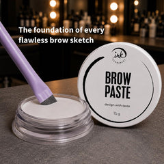 Ink Permanent spatula applicator loaded with paste demonstrating easy, controlled application