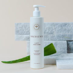 INNERSENSE bottle in hand to show 10 fl oz size and travel-friendly benefit