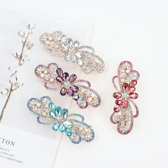 inSowni packaging displaying four colored jeweled tops for gifting