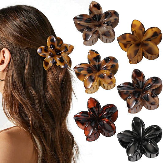 Interesse front view of six flower clips showing colors and design for versatile styling