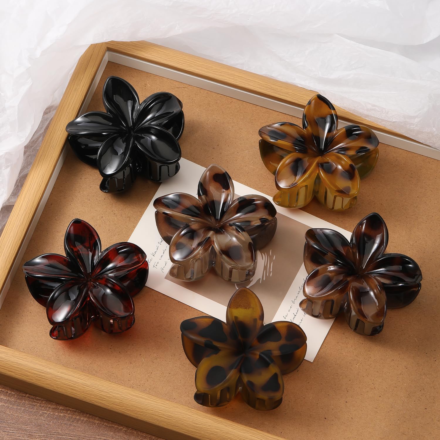 Interesse hair clip worn at beach showing retro floral style for vacation outfits