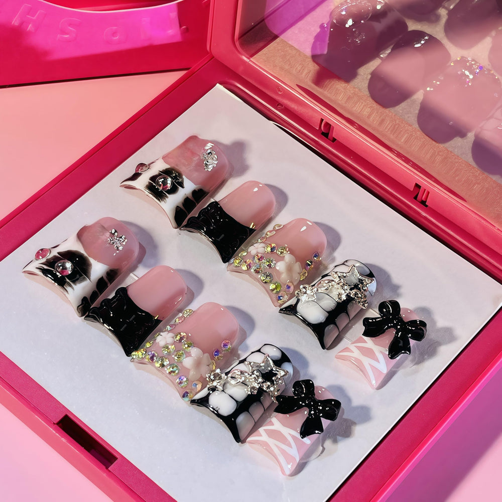 IntoVibes front packaging showing black ballet ribbon nails and quick salon look