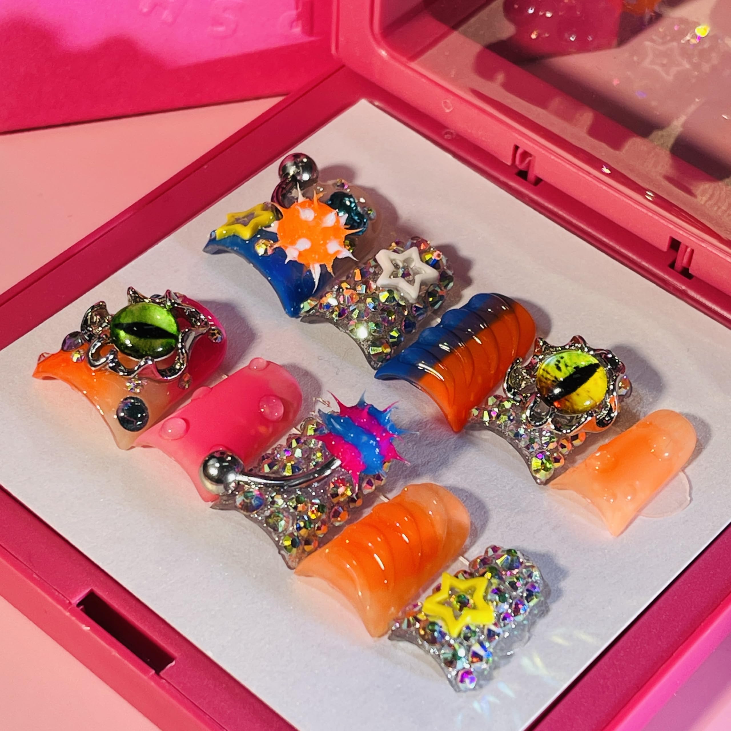 IntoVibes front packaging showing 10 short duck nails and orange charm benefit: ready-to-wear style