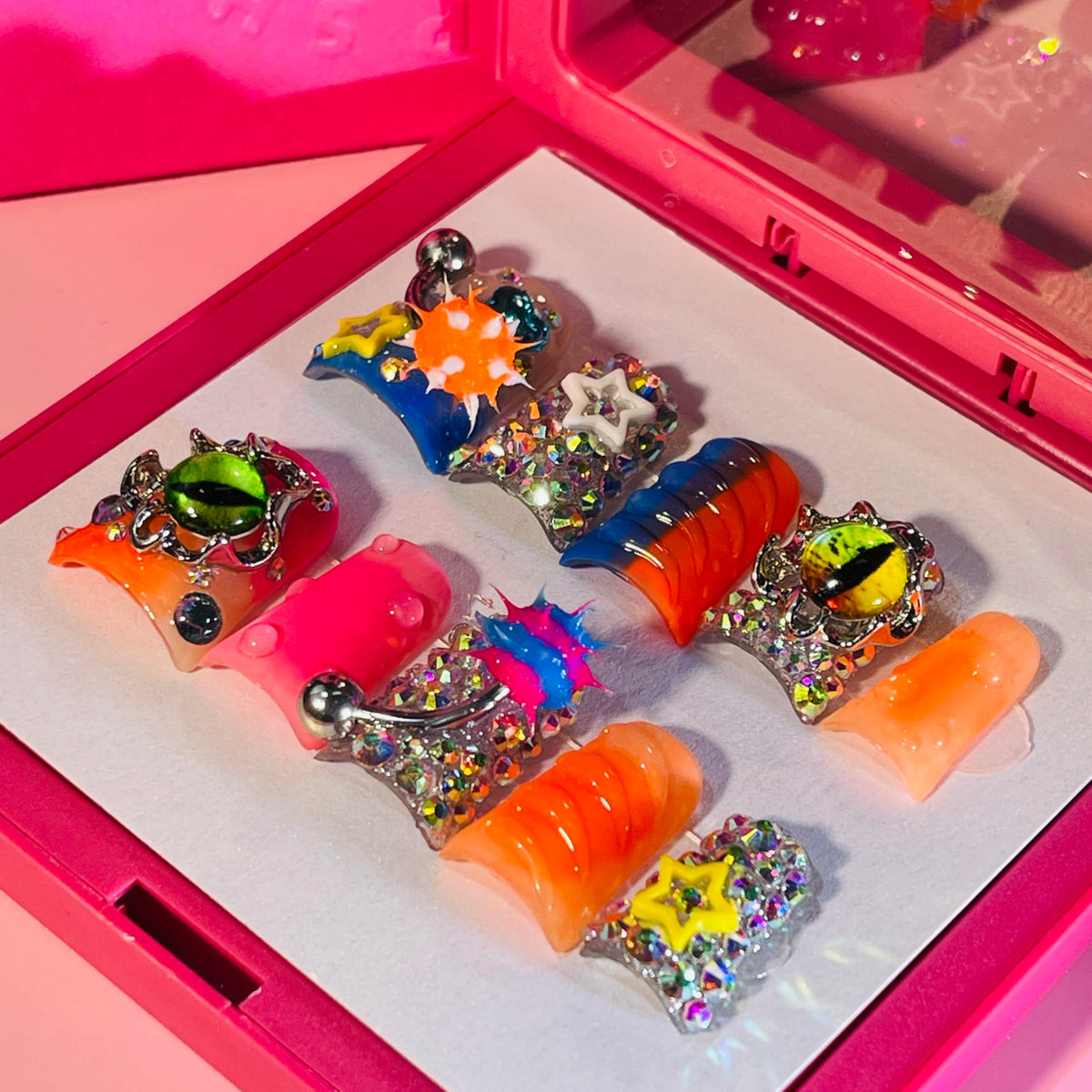 IntoVibes front packaging showing 10 short duck nails and orange charm benefit: ready-to-wear style